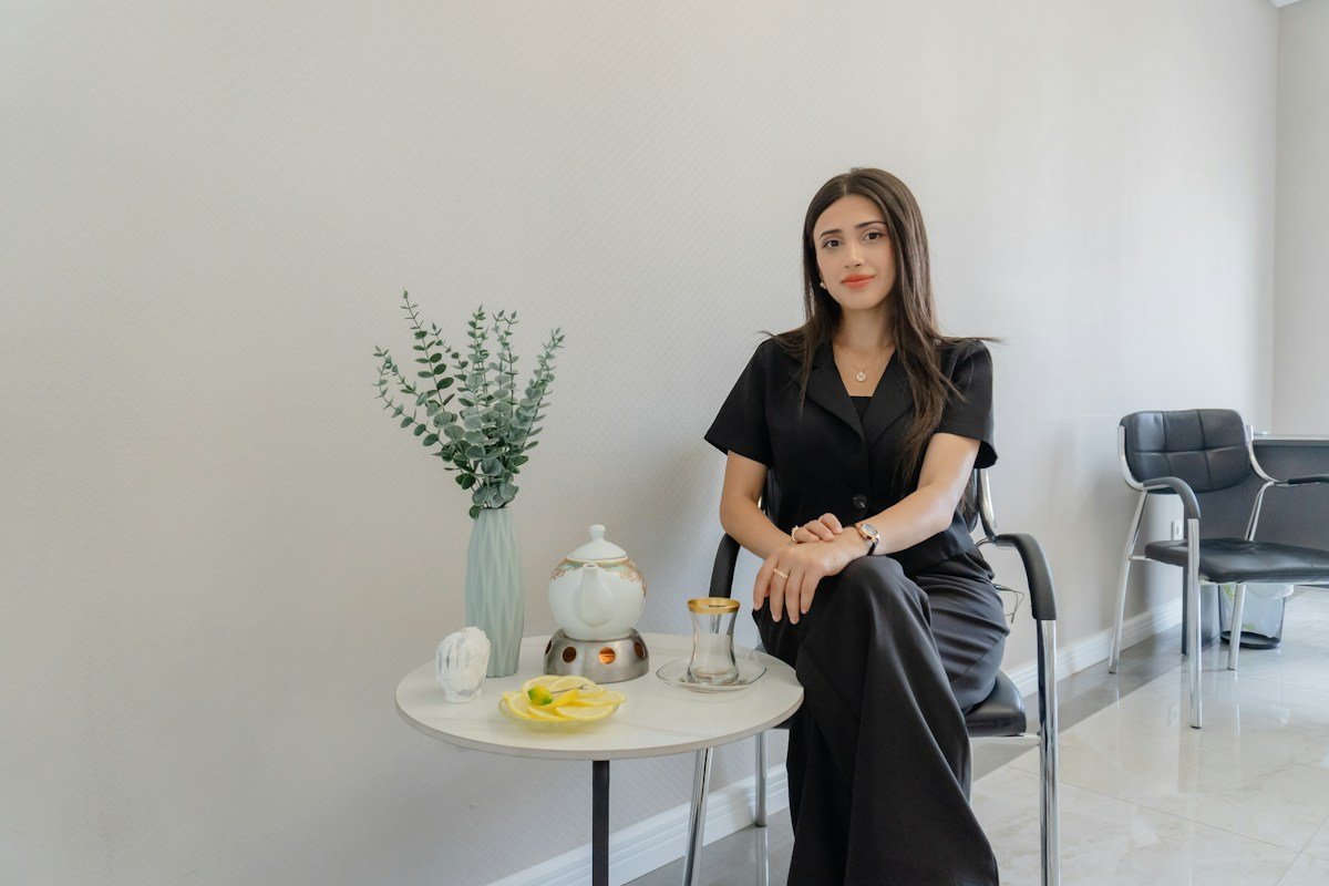 A patient waiting in a bright, modern reception